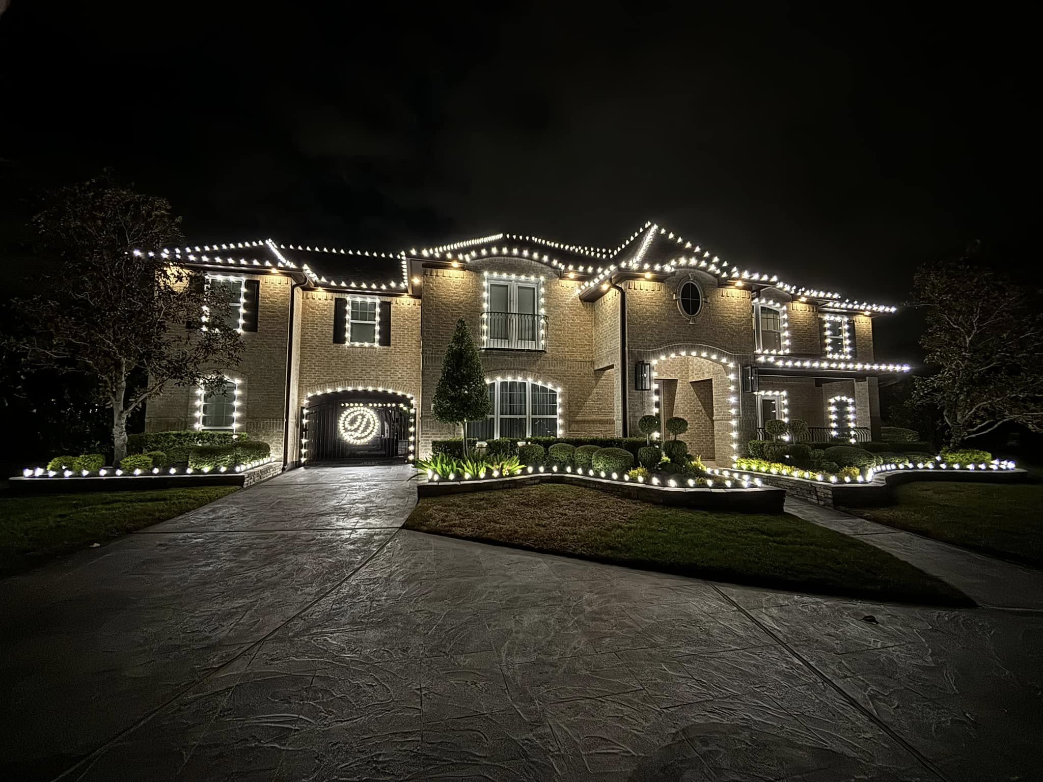 Beautifully decorated home with professional Christmas lights installation